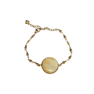 Gouden schakelarmband met ronde gemarmerde gele clay