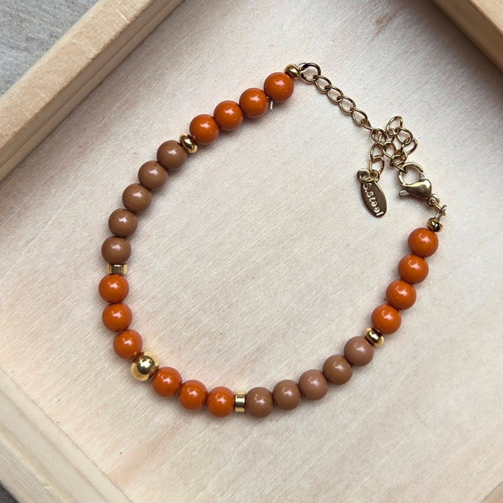 Verstelbare kralenarmband met oranje en bruin - Afbeelding 3